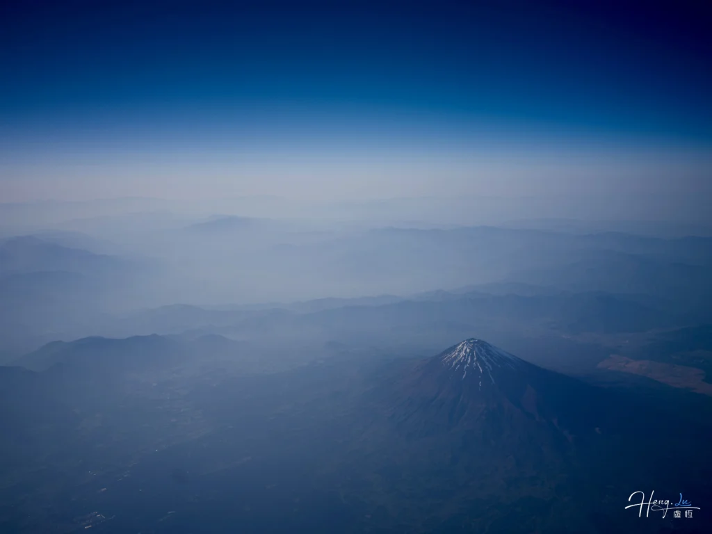 aerial-view-of-mount-fuji-through-blue-mist